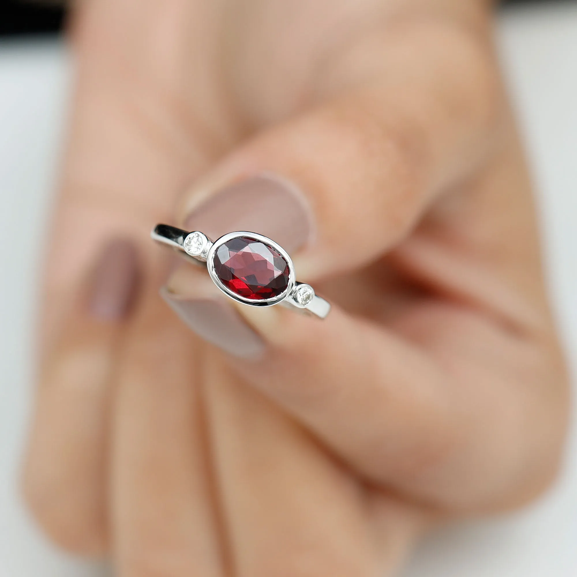 1.75 CT Oval Cut Rhodolite East West Ring with Diamond Stones
