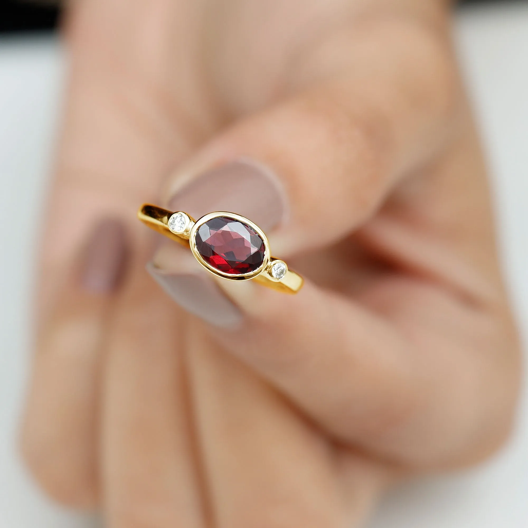 1.75 CT Oval Cut Rhodolite East West Ring with Diamond Stones