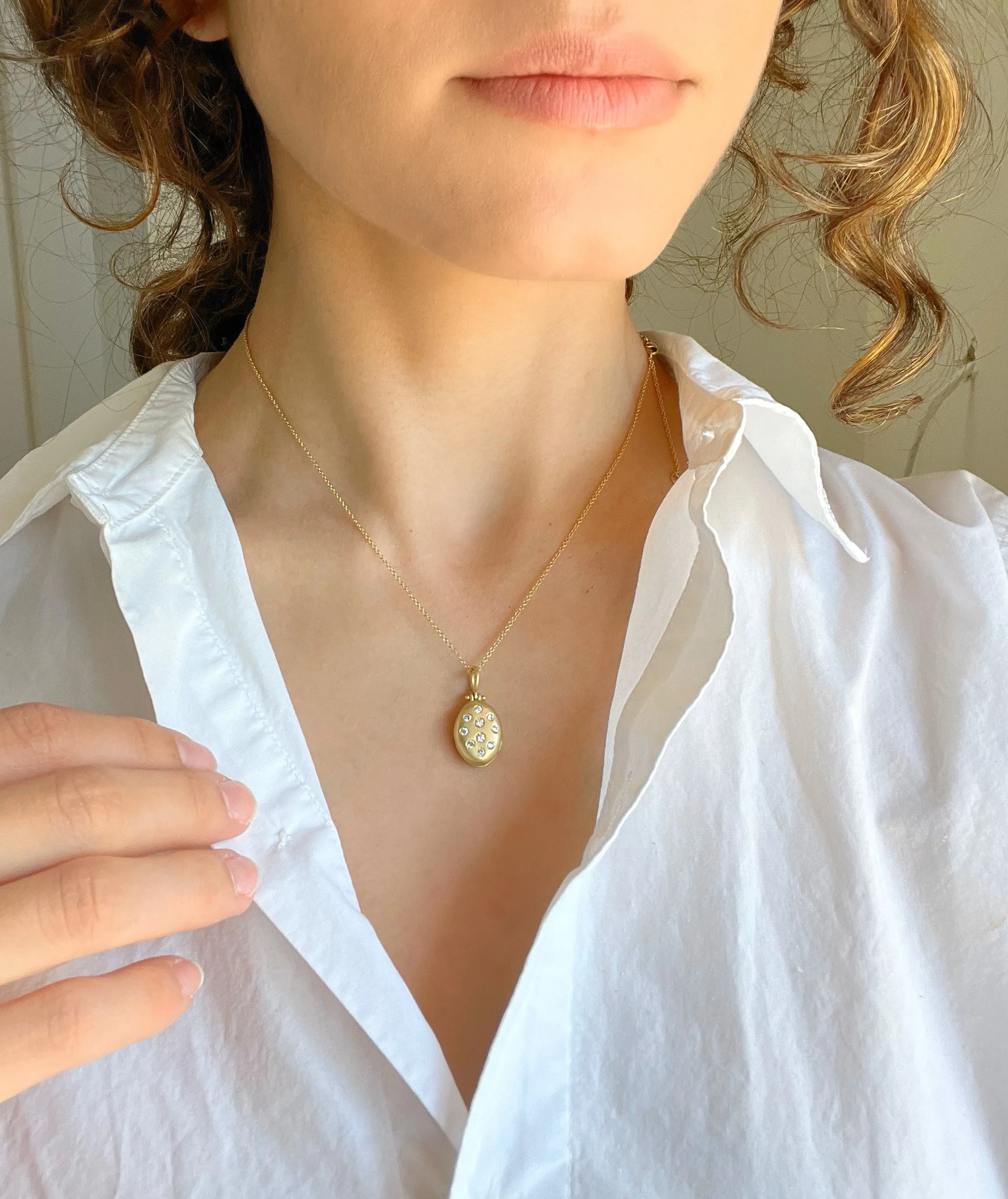18 Karat Gold Diamond Small Oval Locket