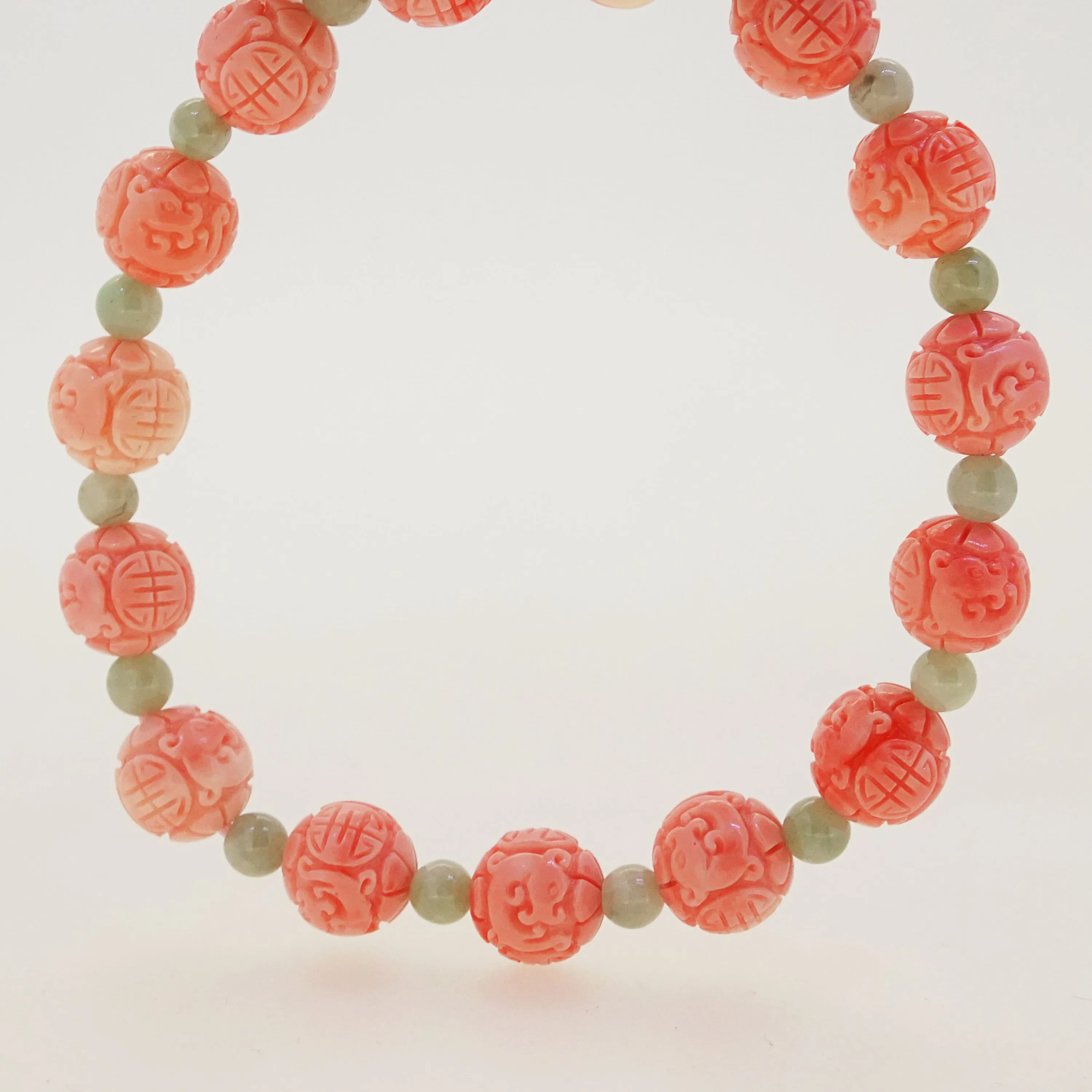 Carved Peach Japanese Coral with Burma Jade 4mm
