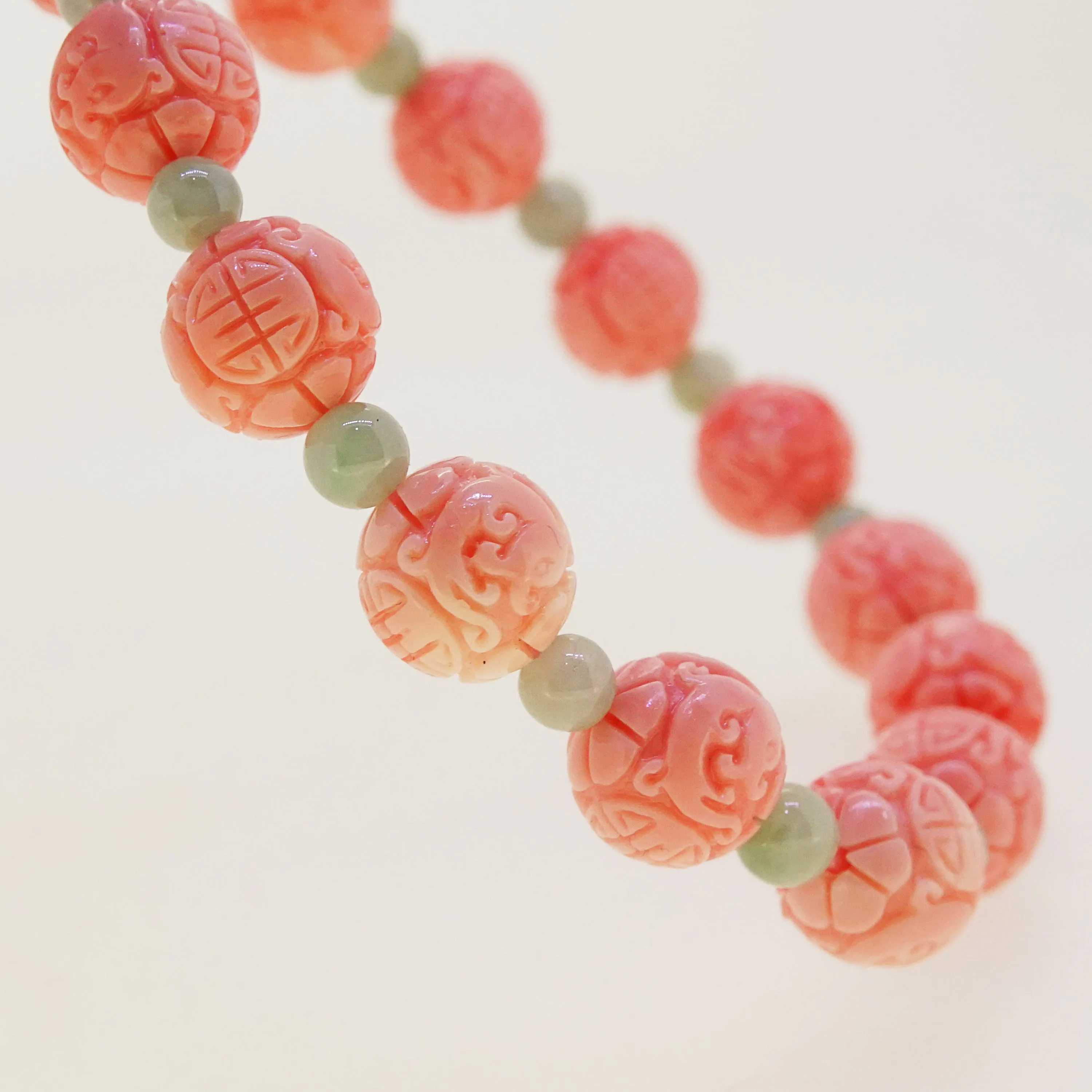 Carved Peach Japanese Coral with Burma Jade 4mm