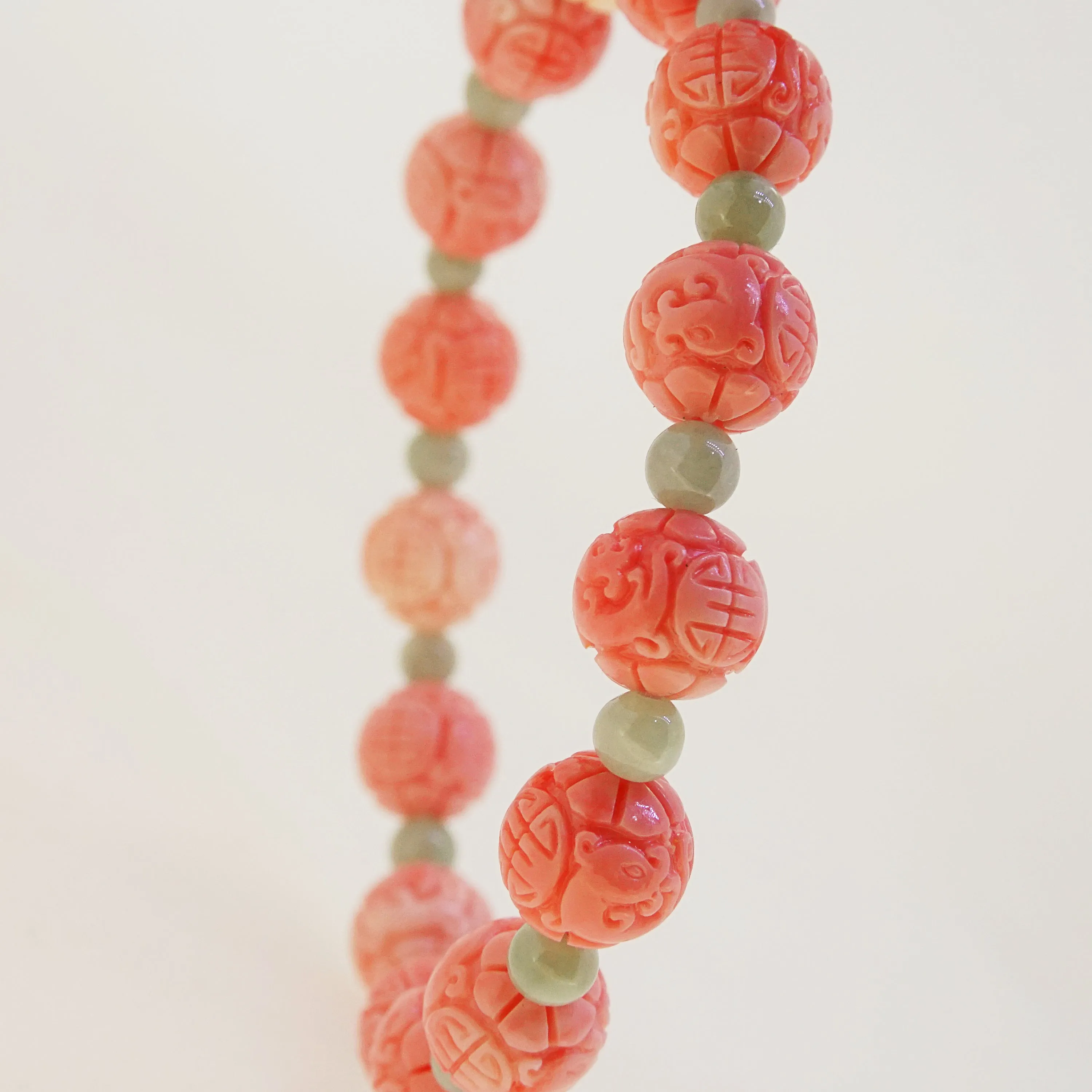 Carved Peach Japanese Coral with Burma Jade 4mm
