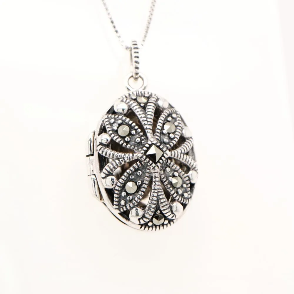 Flower locket in sterling silver with marcasite