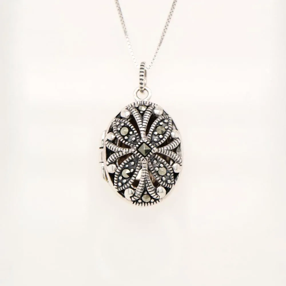 Flower locket in sterling silver with marcasite