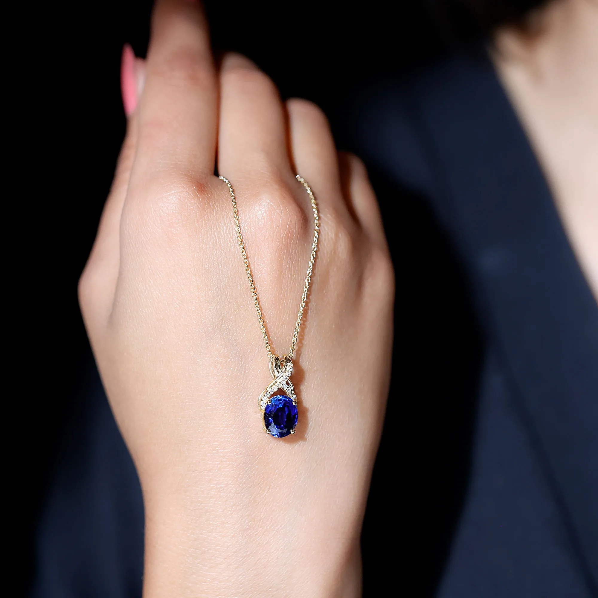 Oval Created Blue Sapphire Solitaire Pendant with Diamond Twisted Bail