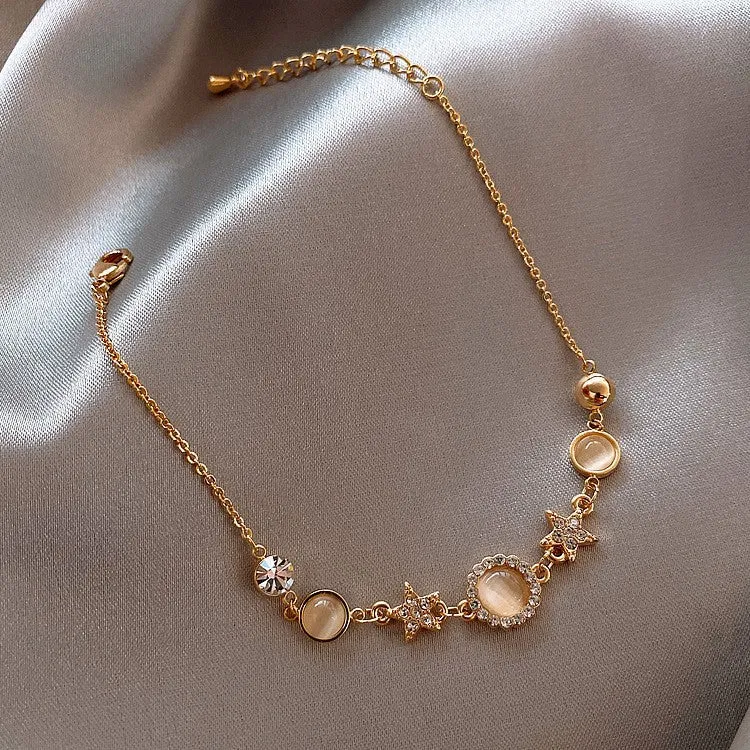 Wholesale Cat's eye stone fish bracelet fashion bracelet net celebrity simple fashion design sense hand jewelry